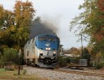 AMTK 179 leads train P092-05 away from the station